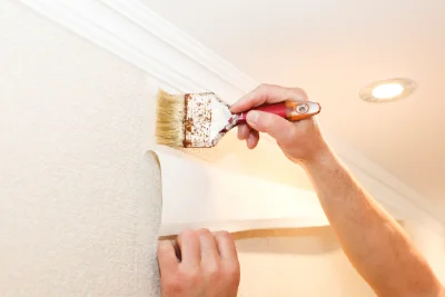 Pose de papier peint à Louslitges — revêtements muraux et toiles de verre